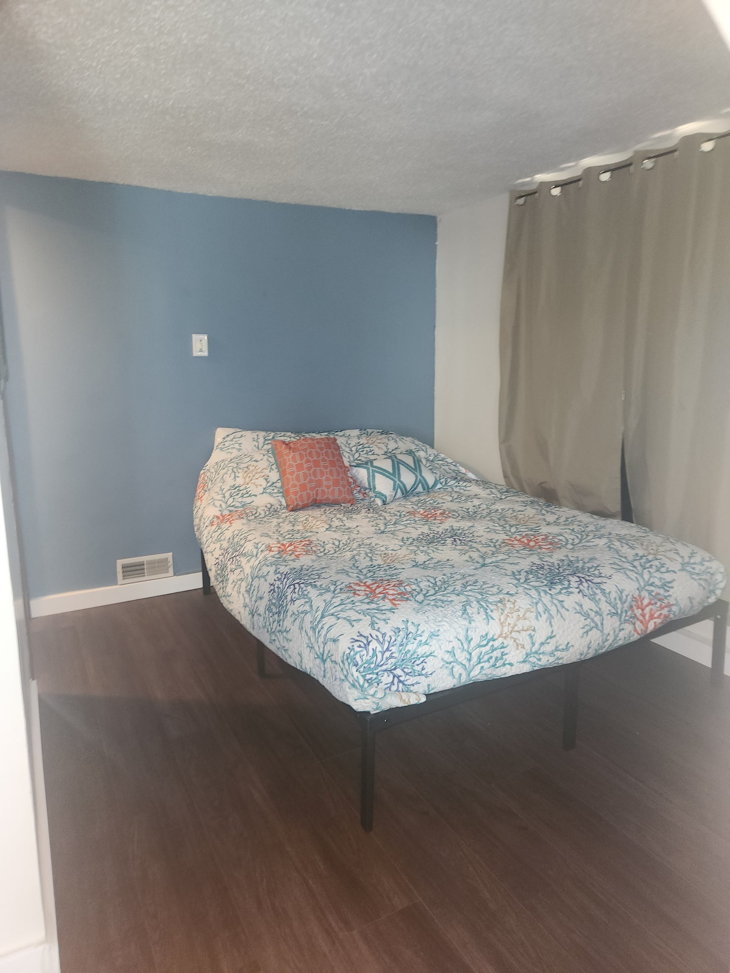 Bedroom 2 with a queen bed and sofa bed